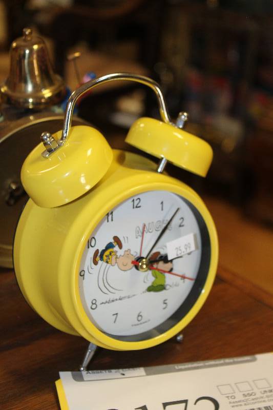 lot 2172 image: Lucy, Charlie Brown Football Battery Operated Alarm Clock