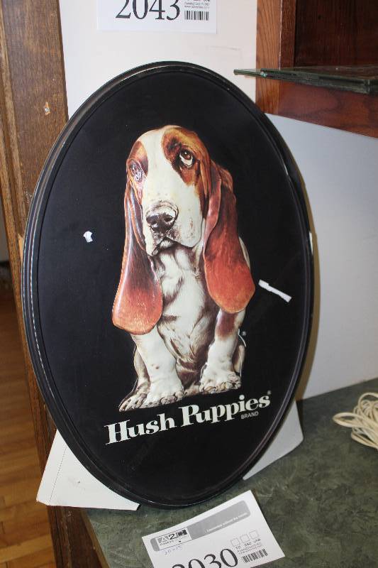 lot 2030 image: Hush Puppies Wall Art