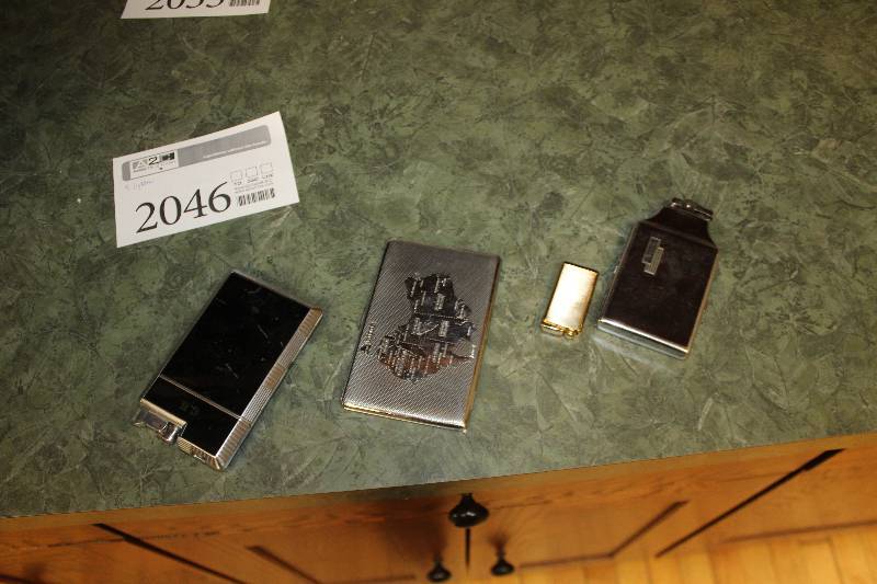 lot 2046 image: Lot of (4) Decorative Pocket Lighters