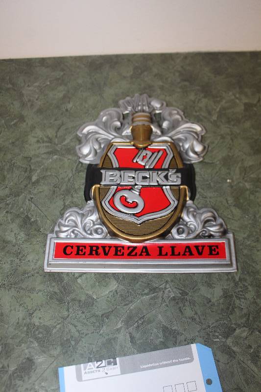 lot 2109 image: Becks Cerveza Llave Wall Art