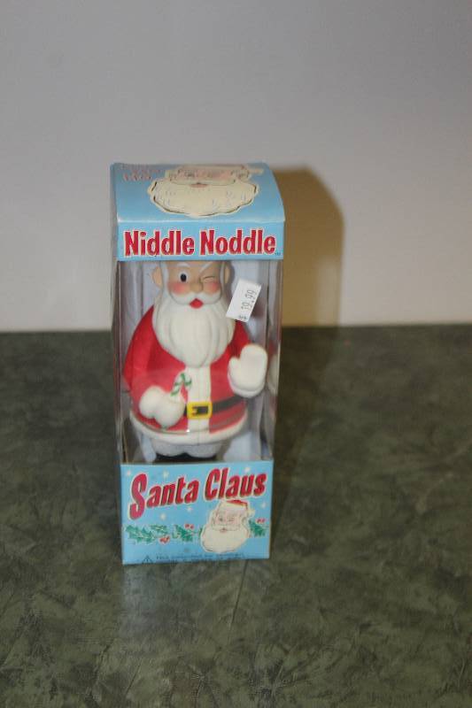 lot 2322 image: The Nodder Guy Santa Claus Figurine