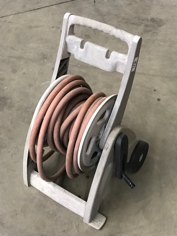 lot 42 image: Plastic Hose Reel With Garden Hose ...