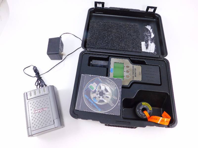 lot 18 image: Tire Pressure Monitor Kit wBattery Charger