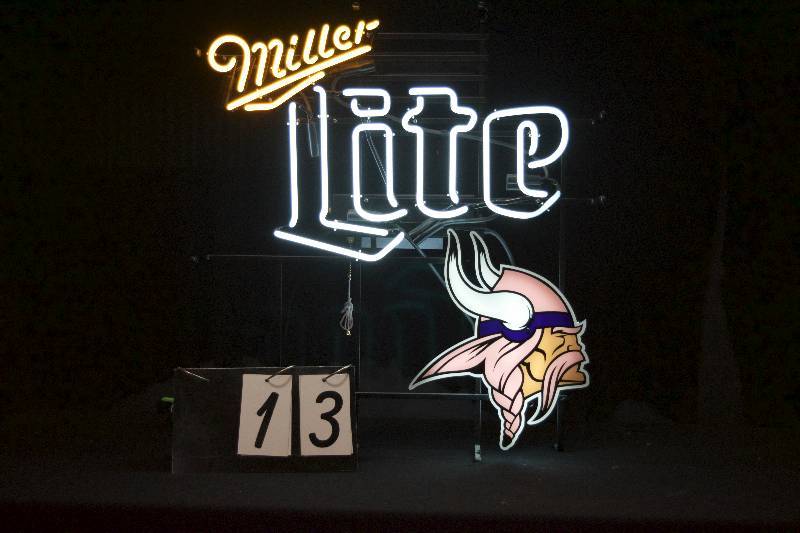 lot 13 image: Miller Lite Minnesota MN Viking, helmet is pink