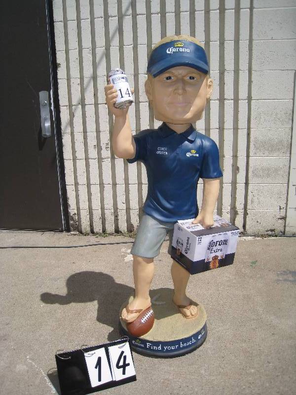 lot 14 image: Corona Beer, Coach Gruden 50 tall bobblehead, rare and very cool (reminds some of us of POTUS Donald Trump)
