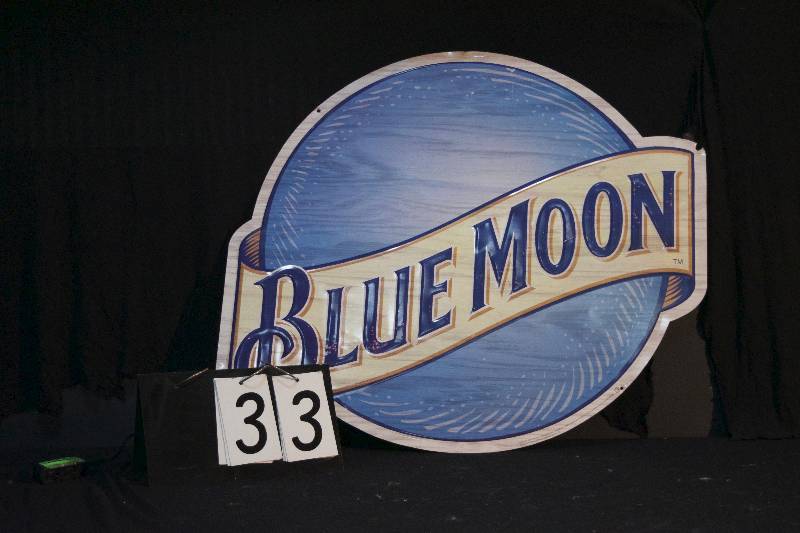 lot 33 image: Blue Moon tin tacker sign, a little rough but cool