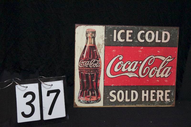 lot 37 image: Coke  Coca-Cola reproduction painted tin sign