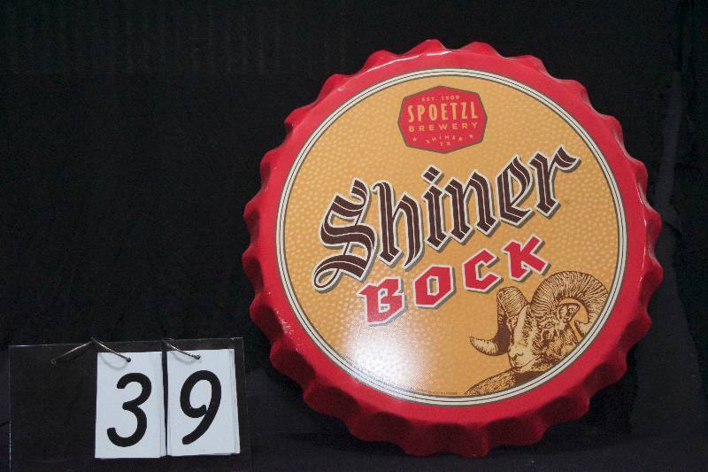lot 39 image: Shiner Bock embossed tin bottle cap sign