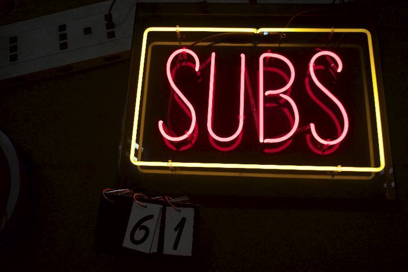 lot 61 image: SUBS neon sign, neon works, NO TRANSFORMER (power supply)