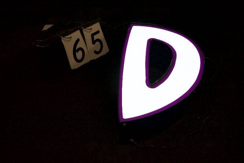 lot 65 image: D LED lit channel letter, has power supply and is ready to hang