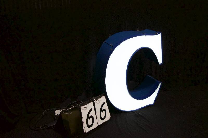 lot 66 image: C neon lit channel letter, has power supply and is ready to hang