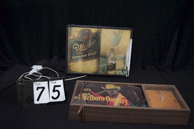 lot 75 image: Miller High Life light up and Marlboro clock light up, both for parts, electrical tests good, need bulbs