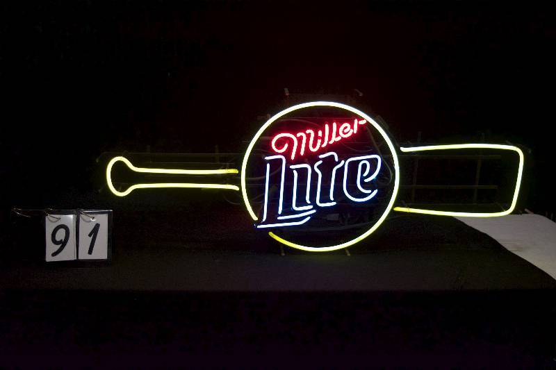 lot 91 image: Miller Lite baseball bat neon