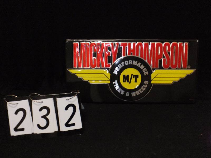 lot 232 image: Mickey Thompson Performance Tires embossed tin tacker sign, looks new