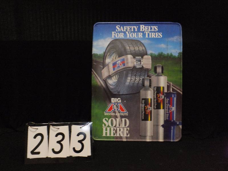lot 233 image: Big A Auto Parts tin sign advertising tires and shocks, nice condition
