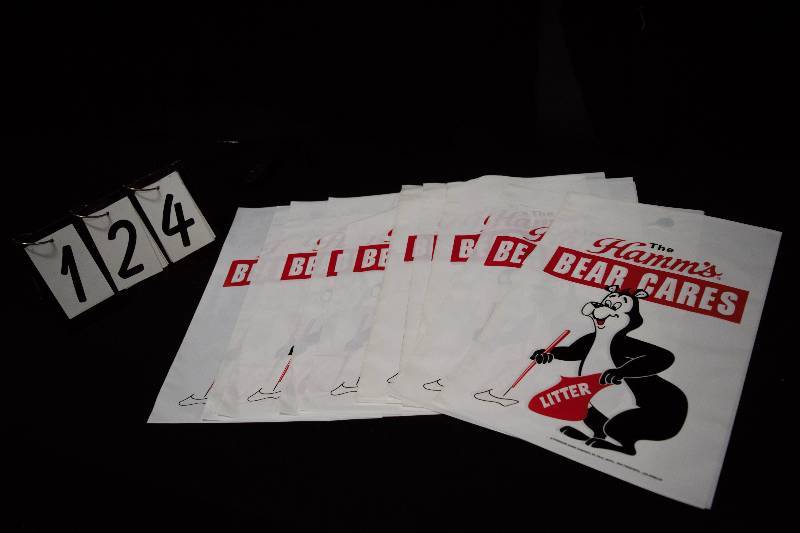 lot 124 image: Unused Hamms litter bags with the bear and Grain Belt logo 15 bags