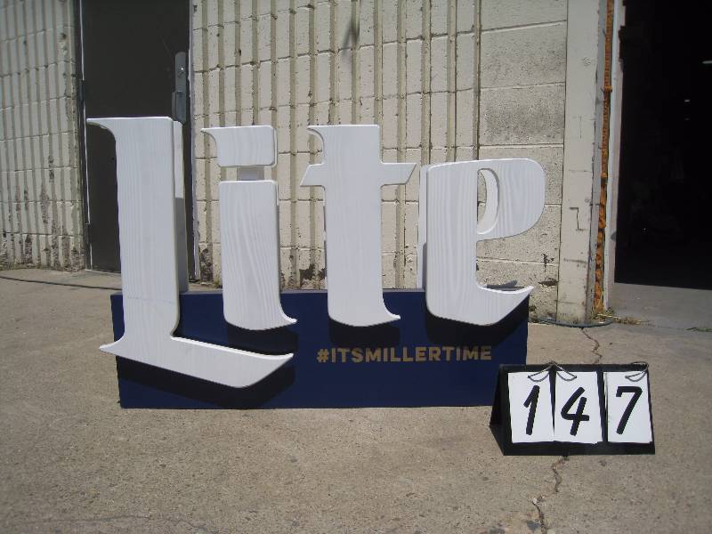 lot 147 image: Miller Lite wall sign, heavy, made of wood