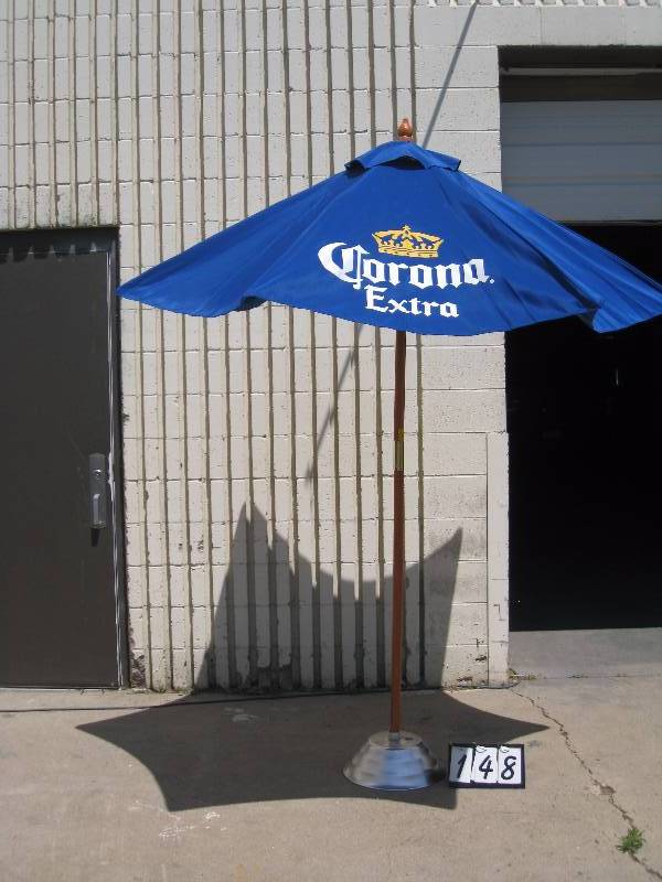 lot 148 image: Corona Beer patio umbrella with stand,