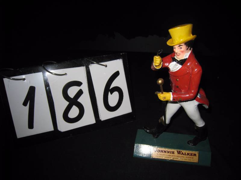 lot 186 image: Johnnie Walker Liquor, Wood advertising figurine, nice sculpture