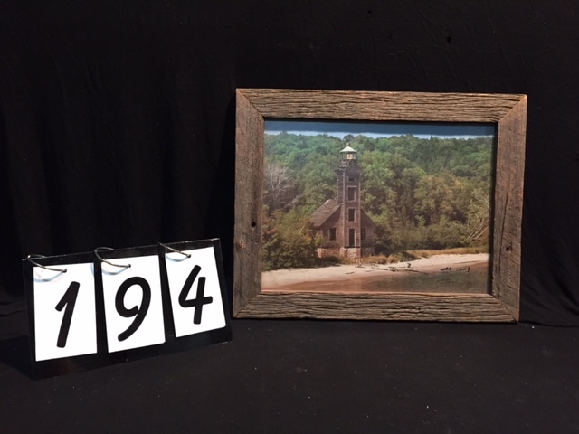 lot 194 image: Lighthouse print, framed with weathered barn board