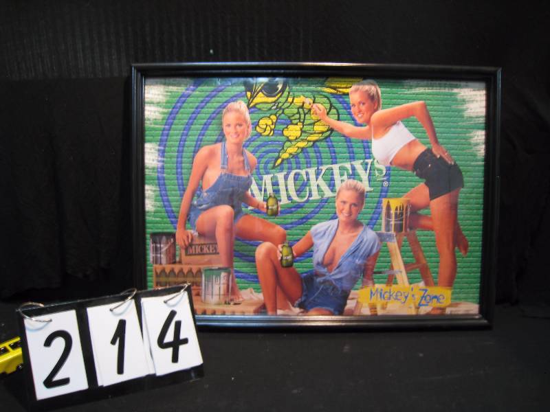 lot 214 image: Mickeys Malt Liquor framed poster, featuring the Dahm Triplets from Apple Valley, MN