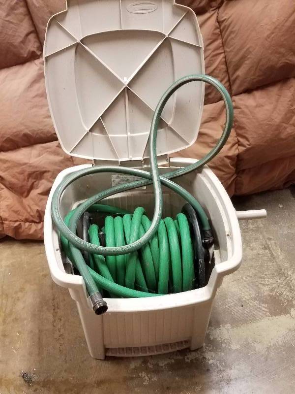 lot 15 image: Garden Hose and Storage