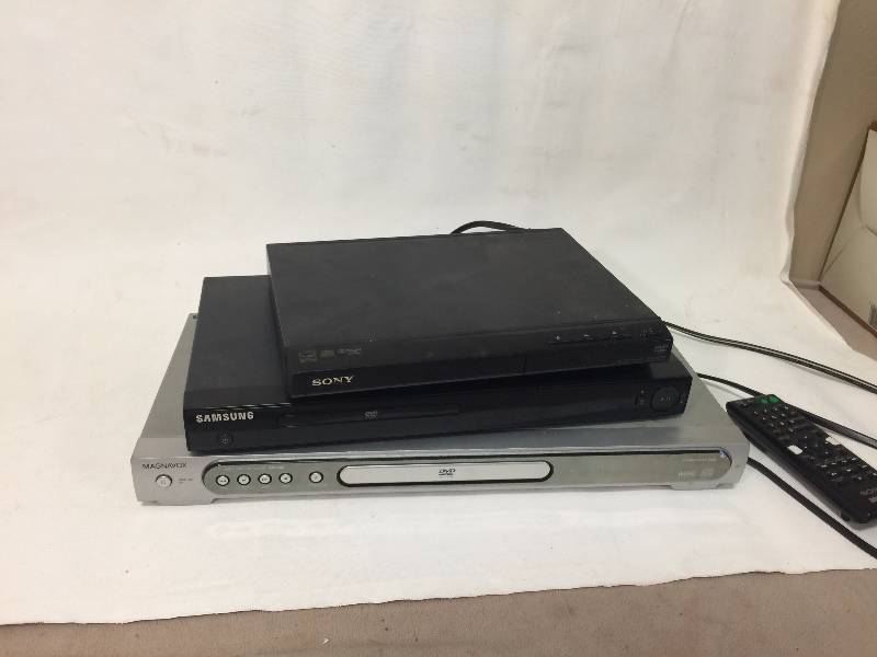 lot 63 image: 3 Dvd players with 1 remote for Sony