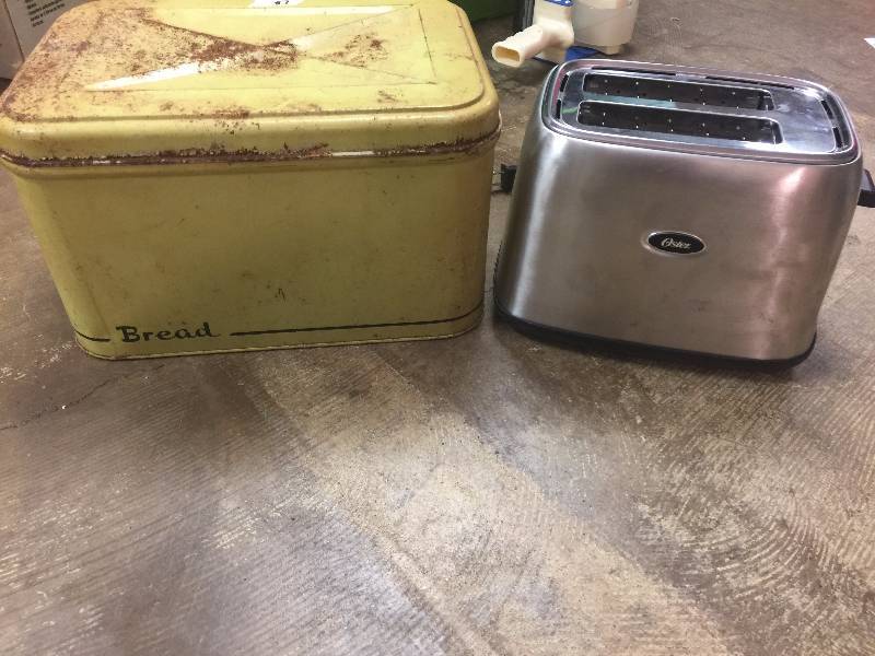 lot 87 image: Yellow bread bin and 1 toaster