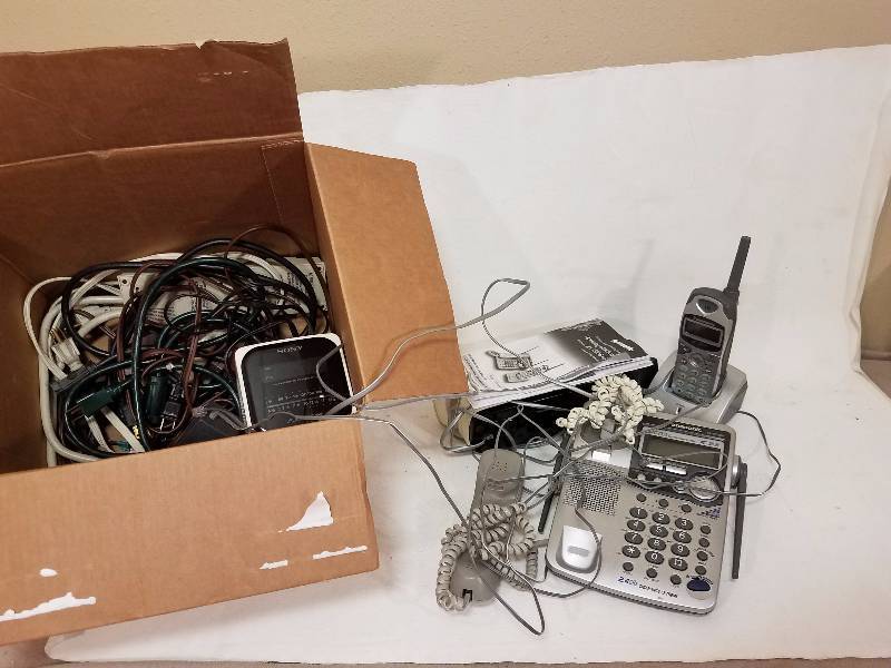 lot 121 image: Cordless phones and cords lot
