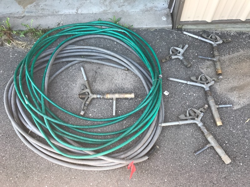 lot 37 image: Garden Hoses & Sprinklers