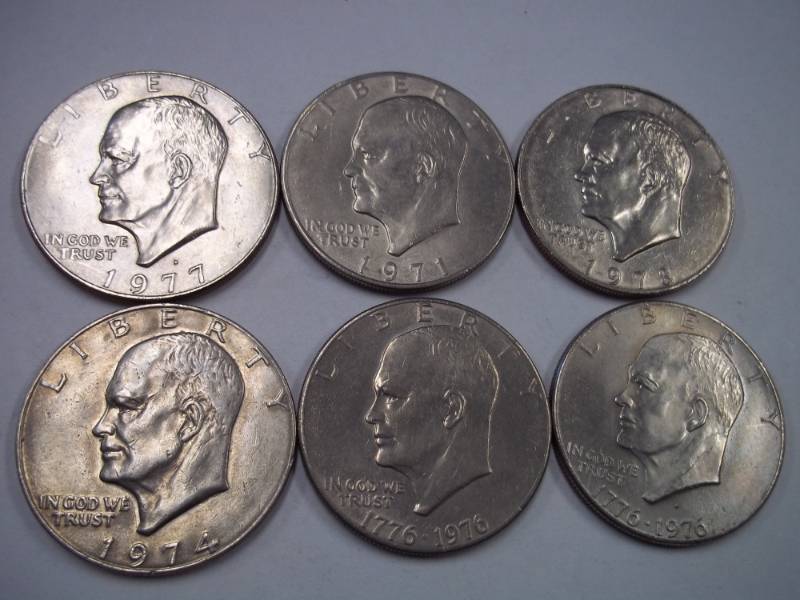 6 EISENHOWER DOLLAR COINS