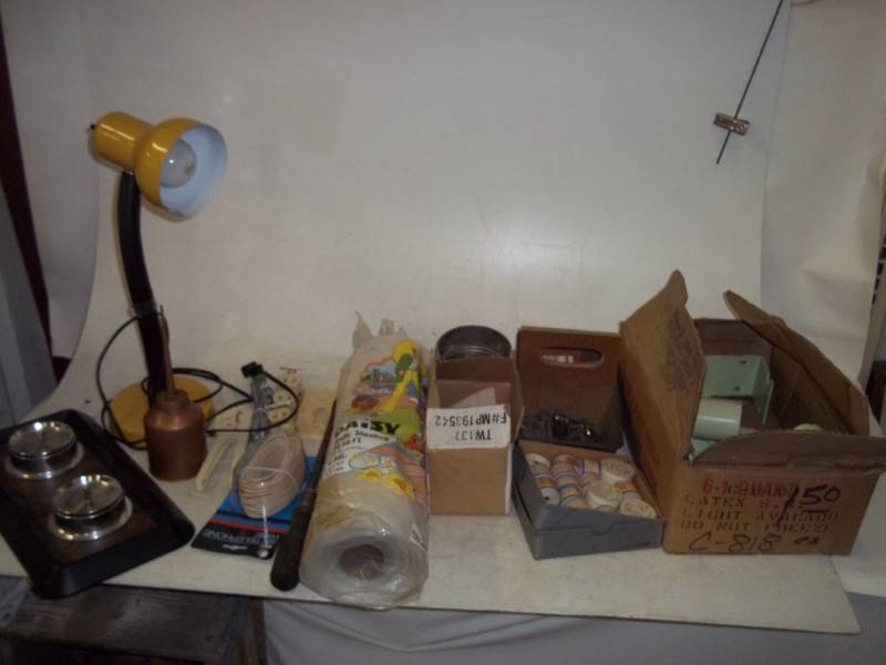 ThermometerBarometer, Yellow Bendable Lamp, Large Screwdriver, Plastic Sheeting, Oiling Can, Electrical Supplies, Box of Heavy Metal Brackets