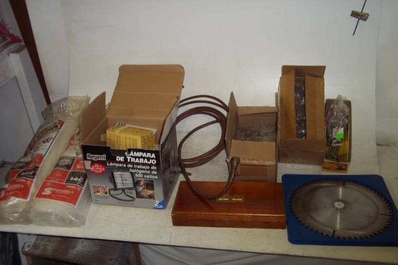 2 Rolls of Plastic Sheeting, 10 Saw Blade, Tap and Die Box, Staples, Metal Hose, Assorted Hardware