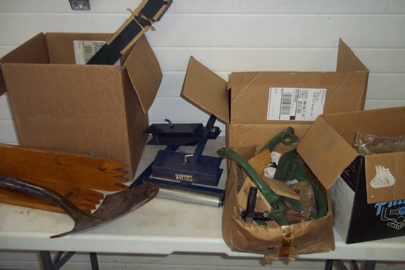 Small Shovel, Automotive Oil Filters, Green Funnel, Metal Pan, Electric Tape, Brushes