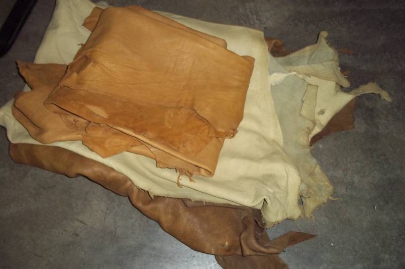 3 Pieces of Leather and Assorted Dental Picks