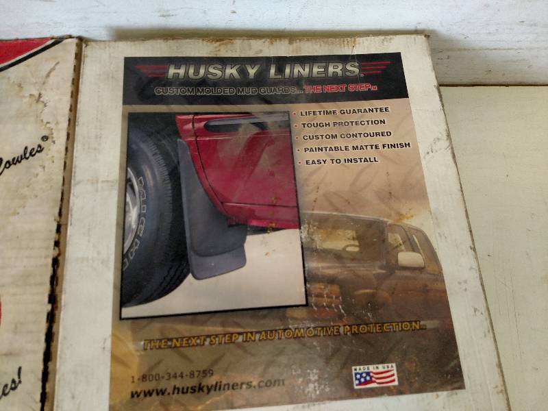 lot 216 image: Mud Flap & Vehicle Trim...