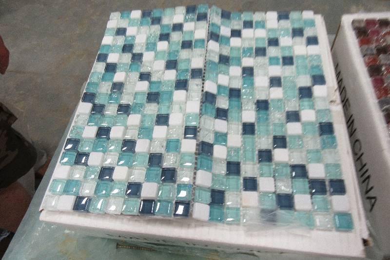 4 boxes of mixed types of tiles..