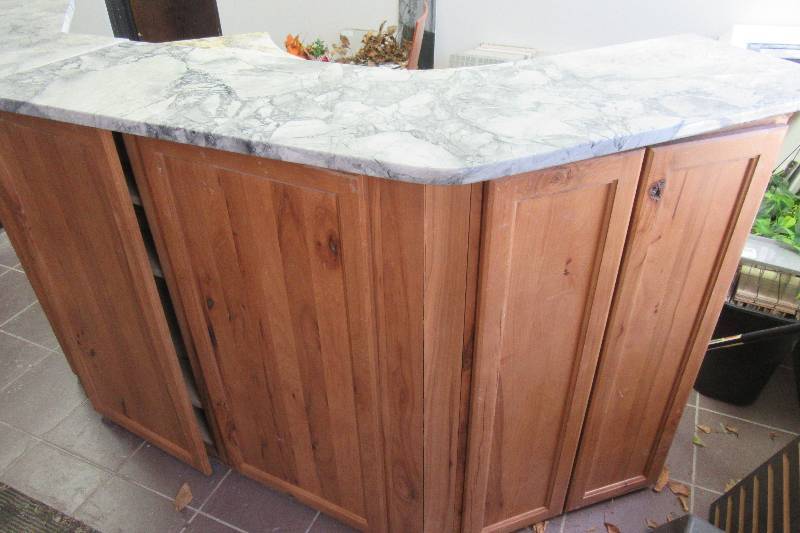 2 part counter unit with drawers and cabinets as shown