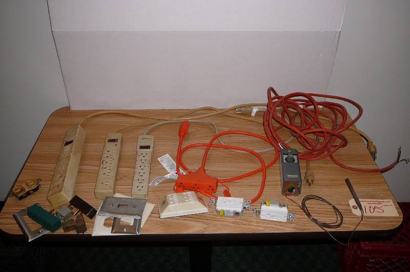 lot 128 image: Lot of Electrical Power strips,cord, plug ins, thermostat & Cord