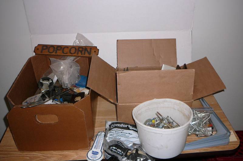 lot 137 image: Hardware Shelf brackets, zip ties, peg board hooks, casters, screws, nails, rod, legs, filers etc.