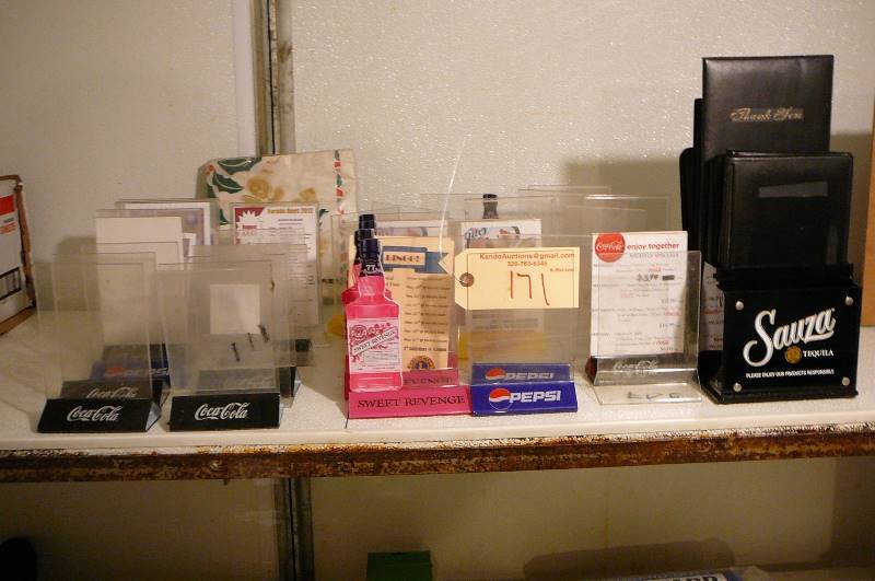lot 171 image: Plastic table advertising holders Sauza Tequila holders Black check holders
