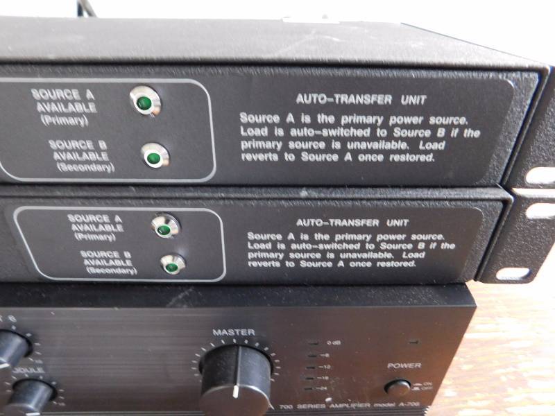 lot 13 image: 2 - Geist Auto-Transfer Units, 1 - TOA A706 Amplifier