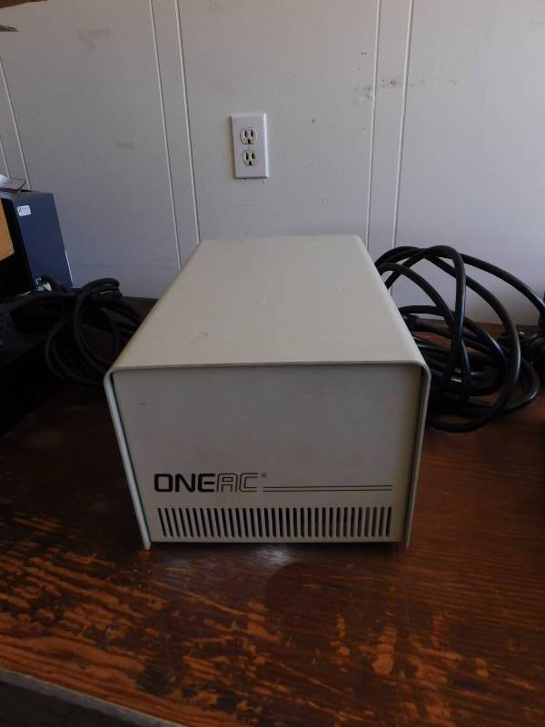lot 15 image: OneAC Power Supply, Model #CB1120