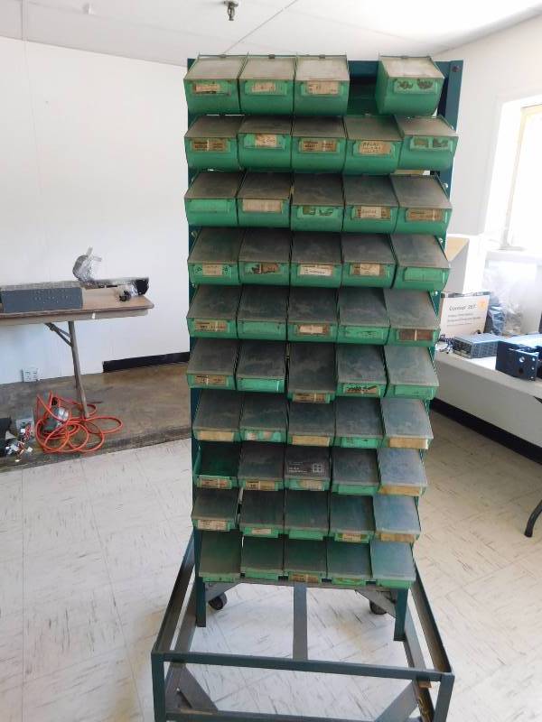 lot 22 image: Vintage Rolling Switchcraft Industrial Parts Bin with 98metal bins