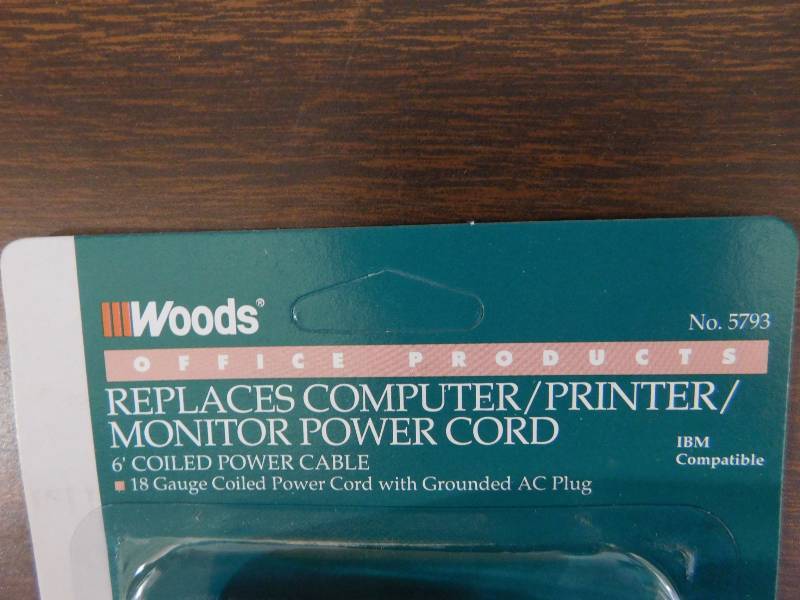 lot 96 image: Woods 6 18 Gauge Coiled Power Cord with Grounded AC Plug (approx. 24 cords)