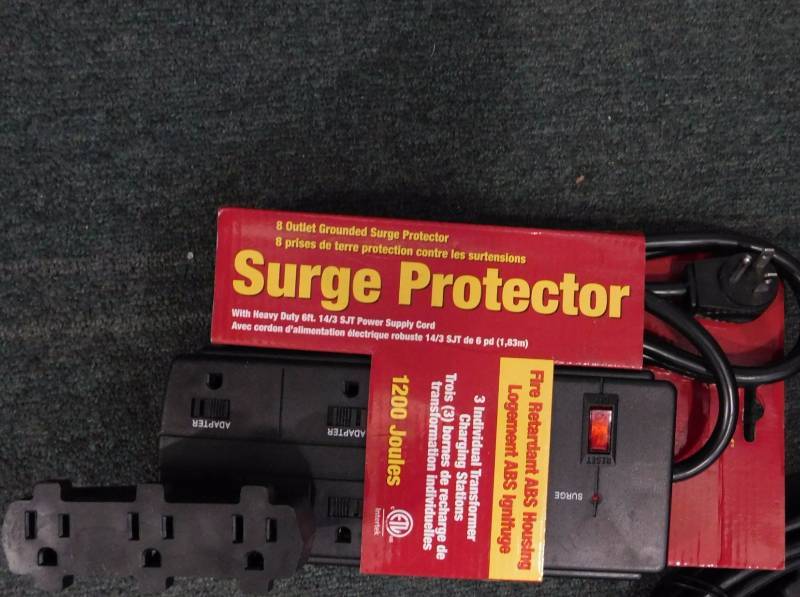 lot 113 image: Various Surge Protectors and Computer Cords