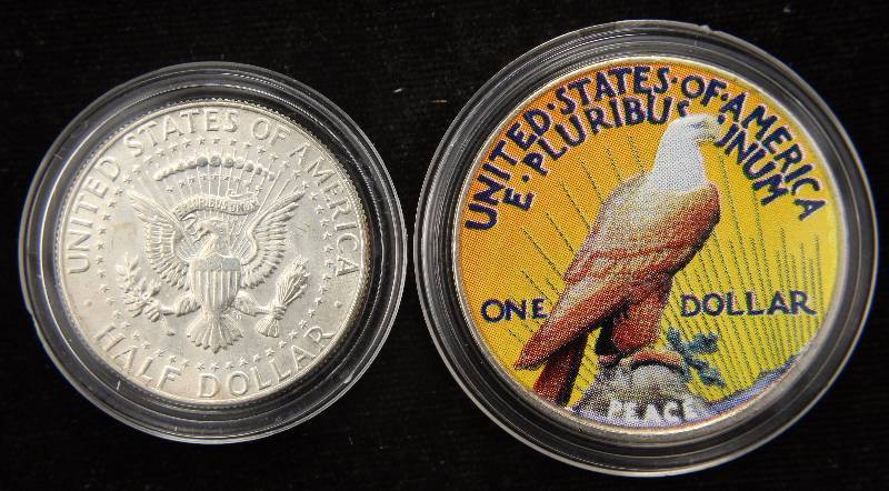 GROUP OF 2 COLORIZED SILVER COINS 1922 PEACE DOLLAR AND 1965 KENNEDY HALF IN AIRTITE