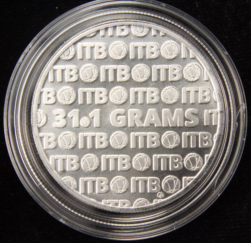 1 TROY OZ. .999 FINE SILVER INTERNATIONAL TRADE ROUND IN AIRTITE HOLDER