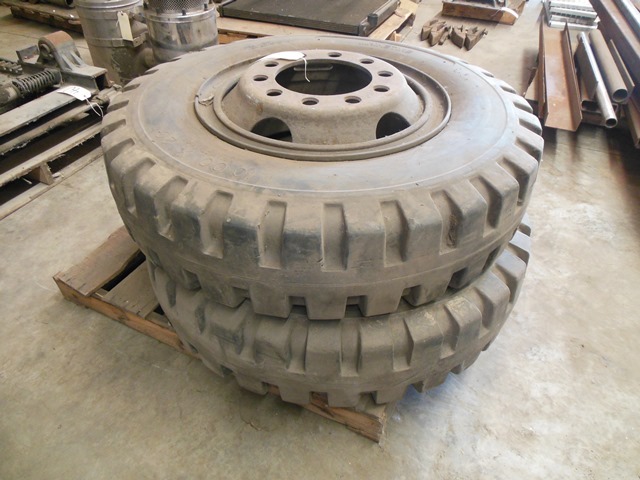 lot 80 image: Two Solid Filled Military Style Truck Tires