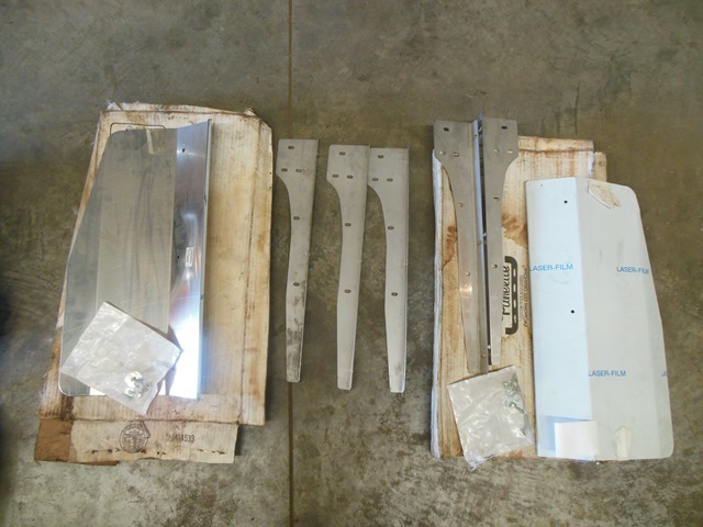 lot 120 image: Panelite Left Side Stainless Steel Fender Shields - missing some parts and hardware